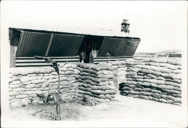 0073 Dau Tieng base camp house. Built bunker on other side. Took some rounds